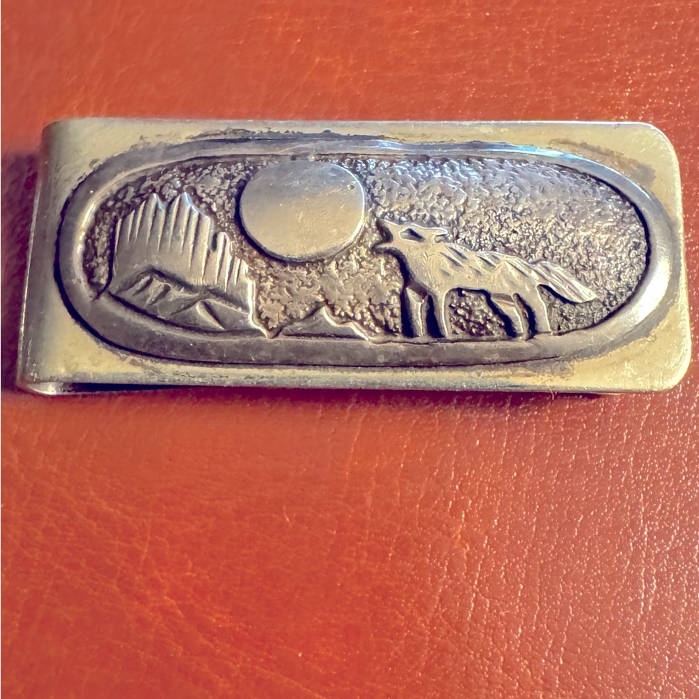 Two western style money clips.